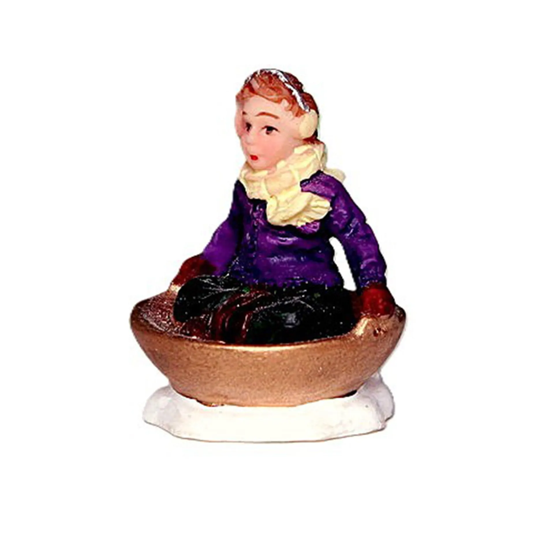 Kerstdorp kind in tobbe slee 2x3cm