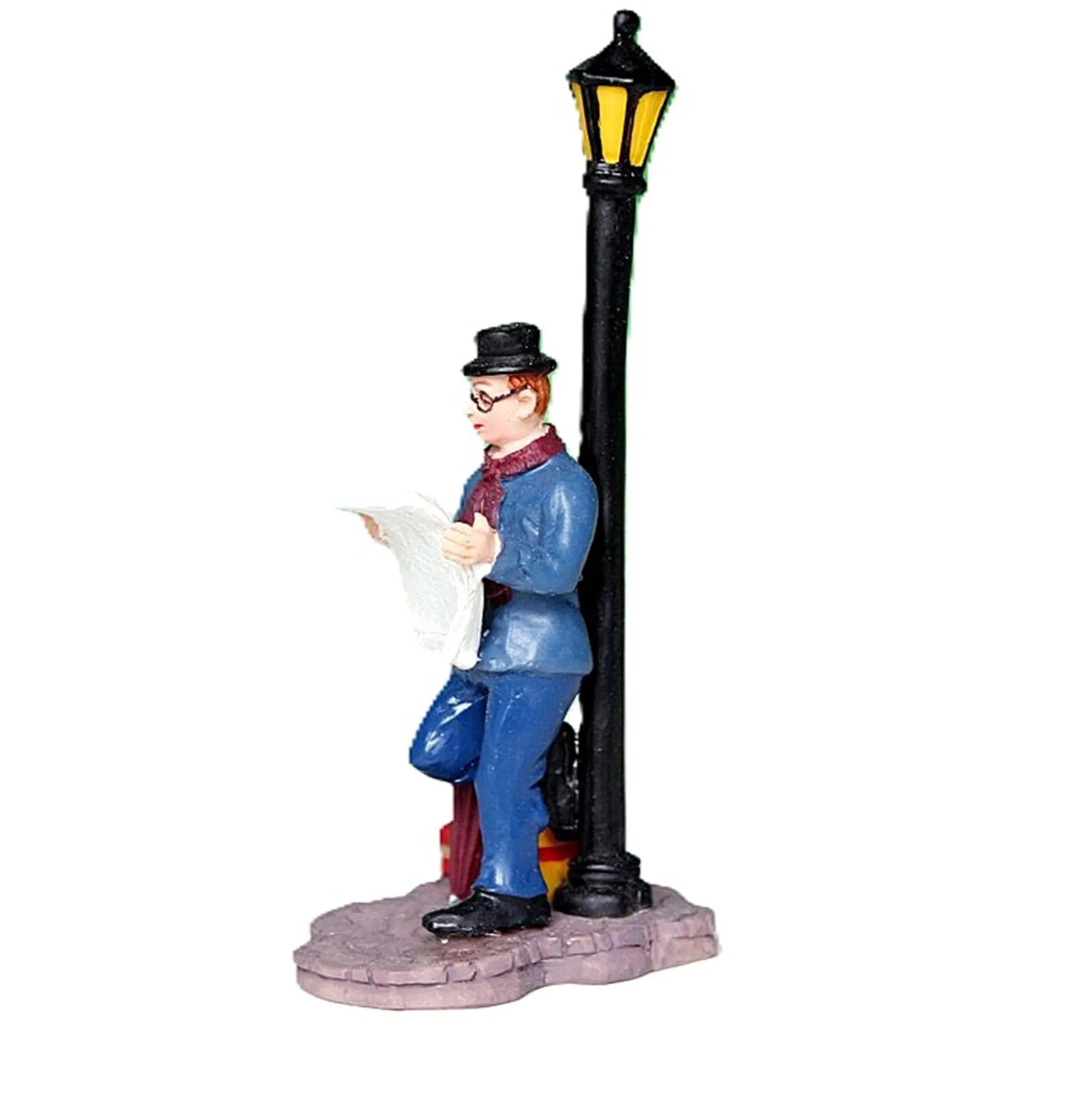Kerstdorp krant lezen