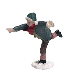 Kerstdorp schaatser groen