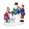 Kerstdorp sneeuwman maken