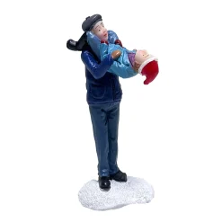 Kerstdorp vader met zoon
